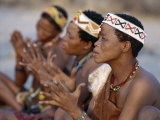 Kung Women Sing and Clap their Hands, They are San Hunter-Gatherers, Often Referred to as Bushmen Photographic Print by Nigel Pavitt