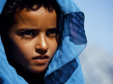 Young Girl in Characteristic Saharan Blue Headscarf Looking into Distance, Sahara, Southern Morocco Photographic Print by Mark Hannaford
