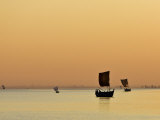 A Golden Sunset on Kaladan River as Numerous Sailing Boats Head for Home, Burma, Myanmar Photographic Print by Nigel Pavitt