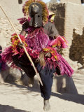Dogon Country, Tereli, A Masked Dancer Leaps High in the Air at the Dogon Village of Tereli, Mali Photographic Print by Nigel Pavitt