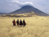 Maasai Warriors Stride across Golden Grass Plains at Foot of Ol Doinyo Lengai, 'Mountain of God', Photographic Print
