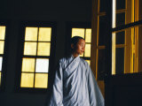 Nun Inside the Linh Phong Pagoda Photographic Print by Paul Harris
