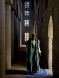 Imam of Kotaka Pauses Beside an Archway Inside the Impressive Mosque on Banks of Niger River, Mali Lámina fotográfica por Nigel Pavitt