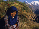 Burusho Girl Returns Home with Fodder for Her Livestock in the Hunza Valley Photographic Print by Amar Grover