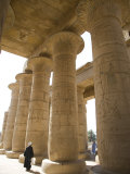 Man Walks Underneath the Giant Columns of the Hypostyle Hall in the Ramesseum, Luxor Photographic Print by Julian Love