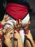 Many Hands Help Support the Base of a Human Castle During the Festival of La Merce in Barcelona Photographic Print by Andrew Watson