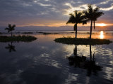 Burma, Lake Inle, Sunset over Lake Inle Which Is Picturesquely Sheltered by Mountains Rising to 1,  Photographic Print by Nigel Pavitt