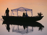 Bride and Groom Leaving a Wedding at Nkwali, Poled on African Gondola, Zambia Photographic Print by John Warburton-lee