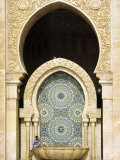 Casablanca a Visitor Is Dwarfed by the Towering Mosaic Tilework of the Hassan Ii Mosque, Morocco Photographic Print by Andrew Watson