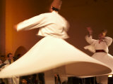 Fes, Two Whirling Dervishes Perform During a Concert at Fes Festival of World Sacred Music, Morocco Photographic Print by Susanna Wyatt