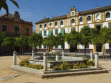 Plaza Del Triunfo in the Real Alcazar Palace in Seville, Spain Photographic Print by John Warburton-lee
