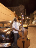 Bass Player, Santiago De Cuba, Cuba, West Indies, Central America Photographie par Angelo Cavalli