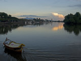 Sampan Ferry on the Sarawak River in the Centre of Kuching City at Sunset, Sarawakn Borneo Photographic Print by Annie Owen