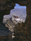 Potala Palace, Seen Through Ruined Fort Window, Lhasa, Tibet Photographic Print by Nigel Blythe