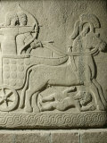 King Striking Down Enemies from his Chariot, Relief, 10th-8th century BC Impressão fotográfica