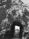 Beach Cave with Water Flooding Through Photographic Print by Images Monsoon