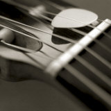 Guitar Strings and Pick Fotografie-Druck von Winfred Evers