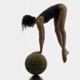 Woman Balancing on Globe Photographie par Images Monsoon