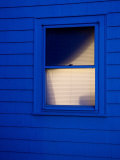 Window with Light On Photographic Print by John Nordell