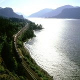 Freight Train Traveling Along Columbia River, Columbia River Gorge, Oregon, USA Photographic Print by Deon Reynolds
