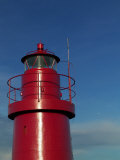 A Red Lighthouse with Blue Sky Photographic Print by Abdul Kadir Audah