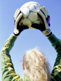 View from Behind of a Girl Holding a Soccer Ball Photographic Print by Steve Cicero