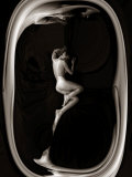 Female Nude Sleeping on Black Background in Oval Frame Photographic Print by Winfred Evers