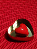 Heart Shaped Box Containing a Love Stone with Strong Red Background Photographic Print by Images Monsoon