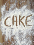 Word Cake in Flour Photographic Print by Neil Overy