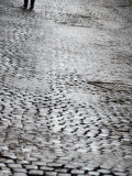 Person's Feet Walking Down Cobblestone Street in Rome, Italy Photographic Print by Andrea Sperling