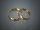Wedding Bands on Glass Photographic Print by Images Monsoon