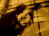 Shadow of a Man Playing Guitar Photographic Print by Images Monsoon