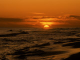 Beach with Sun and Red-Orange Sky Photographic Print by Rob Lang