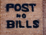 "Post No Bills on Brick Wall" at Million Dollar Lincoln County Courthouse, Pioche, Nevada Photographic Print by Deon Reynolds