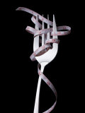 Fork with Measuring Tape Wrapped around It Photographic Print by Laura Johansen