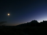 Full Moon Sits over the Teton Range in Wyoming Photographic Print by Drew Rush