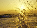 Water Splashing with Sun in the Background Photographic Print by Images Monsoon