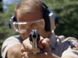 .38 Cal Revolver Is Aimed by a Montgomery Co. Police Officer Photographic Print by Scott Sroka