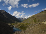 Outfitter with Client in Twin Peaks Pass Photographic Print by Michael Brown