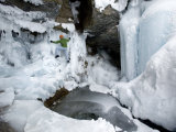 Man Climbs in an Ice Cave Photographic Print by Dawn Kish