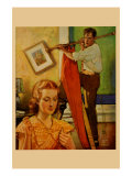 Wife Sews While a Man Hangs a Picture Posters