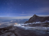 Stars and Torch Lights Illuminating Hiking Trail, Kinabalu National Park, Sabah, Malaysia, Asia Photographic Print by Christian Kober