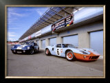 1964 Shelby Daytona Coupe & 1969 Ford GT-40 Framed Giclee Print by David Newhardt