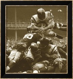 Over The Top: The Redskins vs. The Giants, noin 1960 Juliste tekijänä Robert Riger Over The Top: The Redskins vs. The Giants, noin 1960 Juliste tekijänä Robert Riger