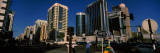 Traffic Light and Skyscrapers, Sheikh Rashid Bin Saeed Al Maktoum Street, Abu Dhabi, U.A.E. Lámina fotográfica por Panoramic Images Traffic Light and Skyscrapers, Sheikh Rashid Bin Saeed Al Maktoum Street, Abu Dhabi, U.A.E. Lámina fotográfica por Panoramic Images