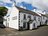 Mcbrides Pub, Cushendun, County Antrim, Ireland Photographic Print