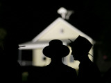 Amish Men in Front of the Schoolhouse Where a Gunman Shot Several Students and Himself Photographic Print