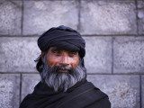 Shoe Maker Sitting on the Roadside Waiting for Customers in Islamabad Photographic Print