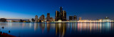 Buildings in a City Lit Up at Dusk, Detroit River, Detroit, Michigan, USA Photographic Print by Panoramic Images 