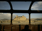 Afghan Drives Past the Darul Aman's Palace in the City of Kabul, Afghanistan Photographic Print